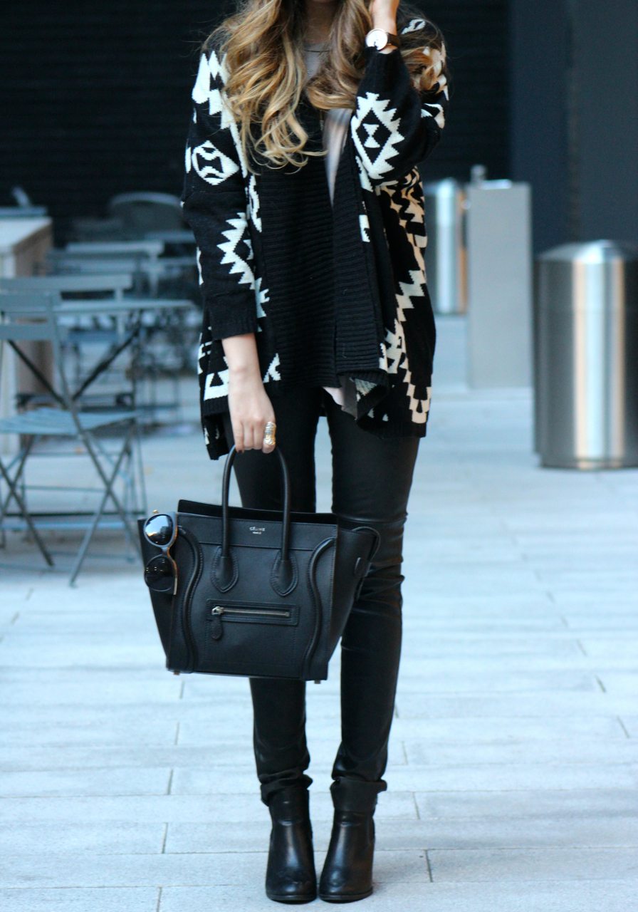 edgy fall outfit with leather pants and oversized sweater