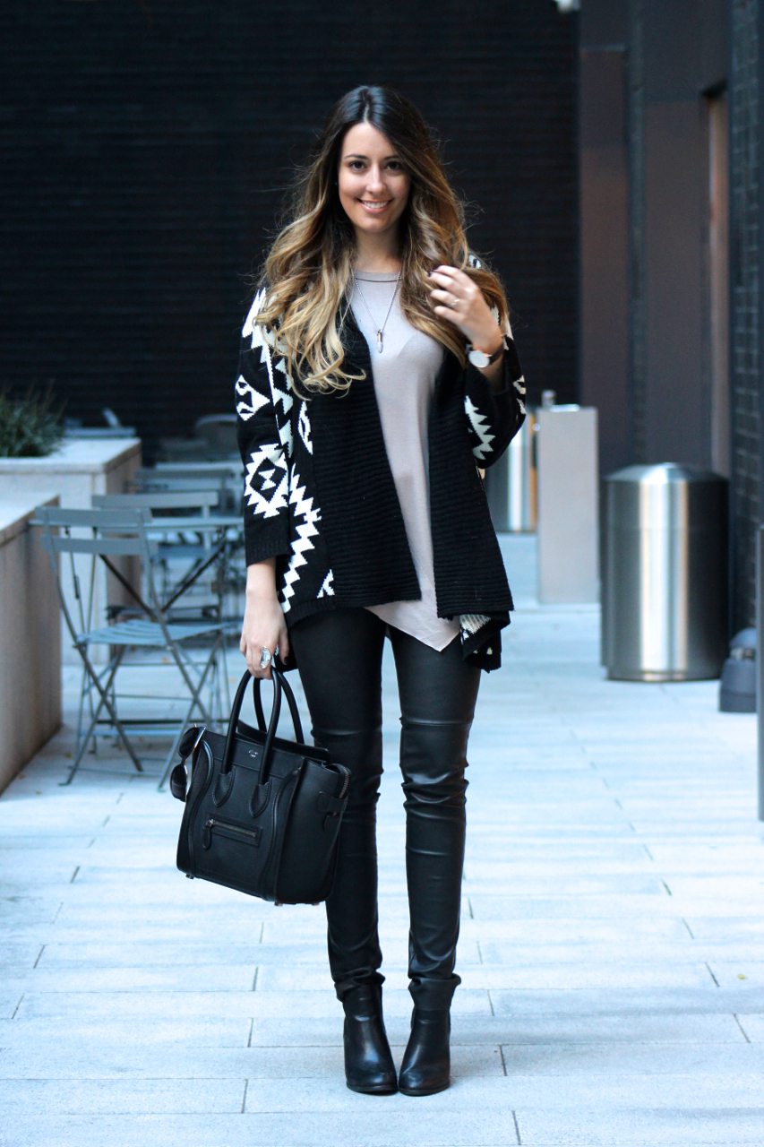 edgy fall outfit with leather pants and oversized sweater