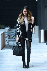 edgy fall outfit with leather pants and oversized sweater
