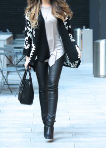 edgy fall outfit with leather pants and oversized sweater