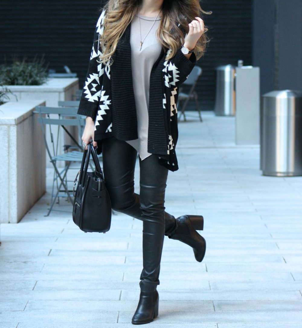 edgy fall outfit with leather pants and oversized sweater