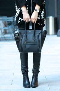 edgy fall outfit with leather pants and oversized sweater