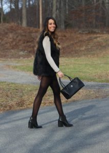 cute fall outfit shorts tights boots and faux fur vest